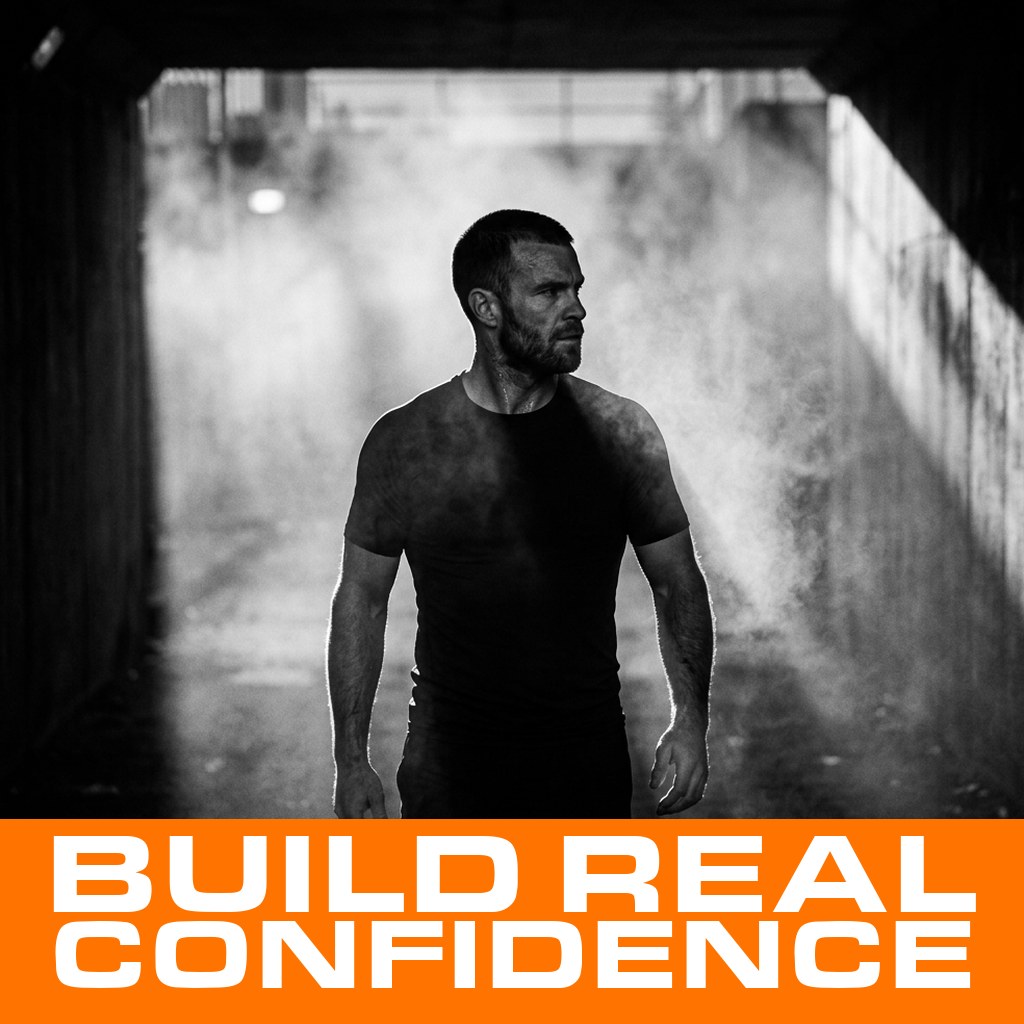 MenTools blog feature image for MEN: How Can a Man Become More Confident? What Actually Works, black and white photograph with orange MenTools overlay