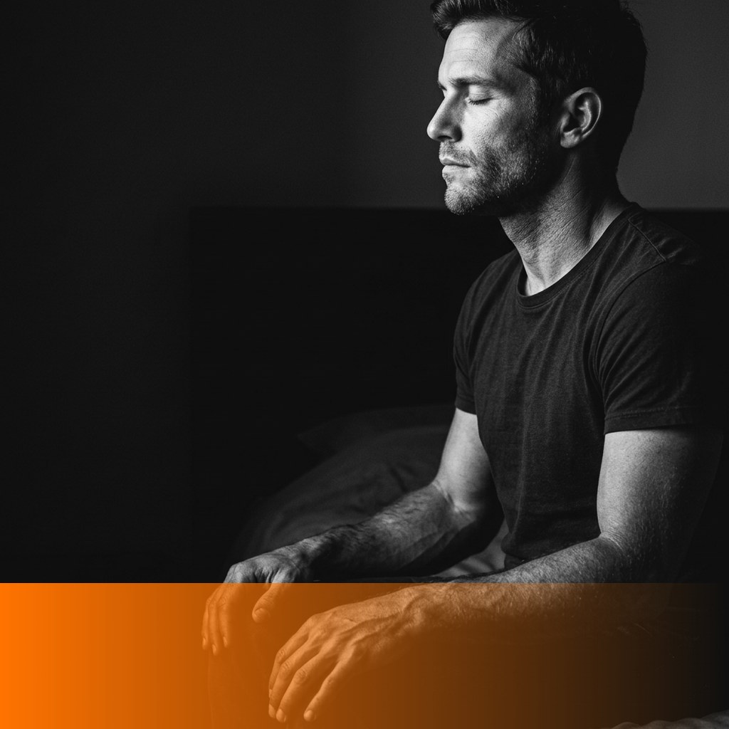 MenTools blog feature image for MEN: Breathwork vs Meditation: Which Settles a Man's Stress Faster?, black and white photograph with orange MenTools overlay